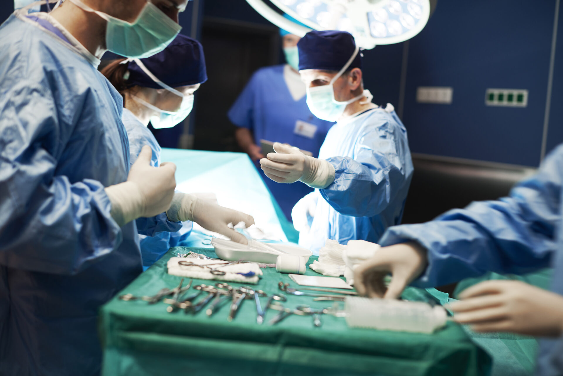 Surgeons working in a modern orthopedic operating theatre
